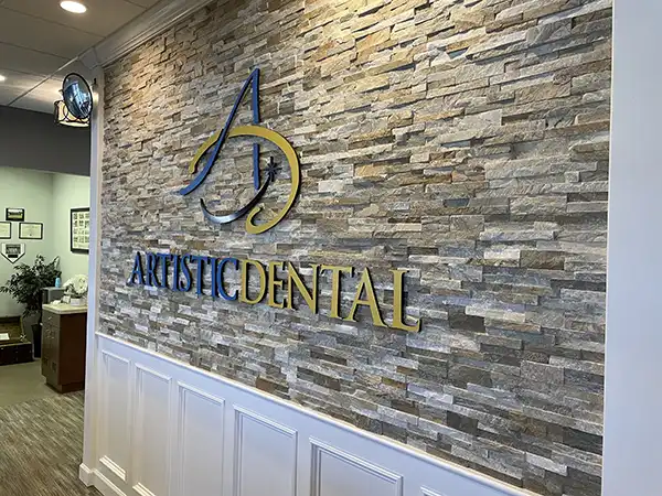 Artistic Dental sign on office wall in Jackson, NJ
