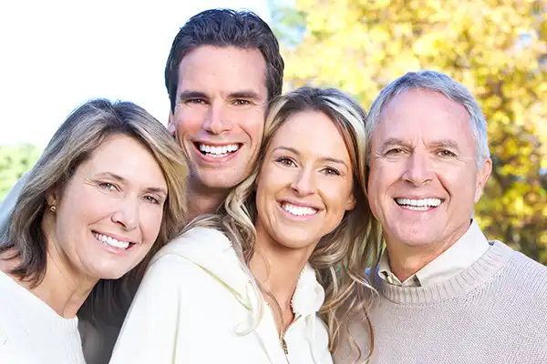 Smiling family of four
