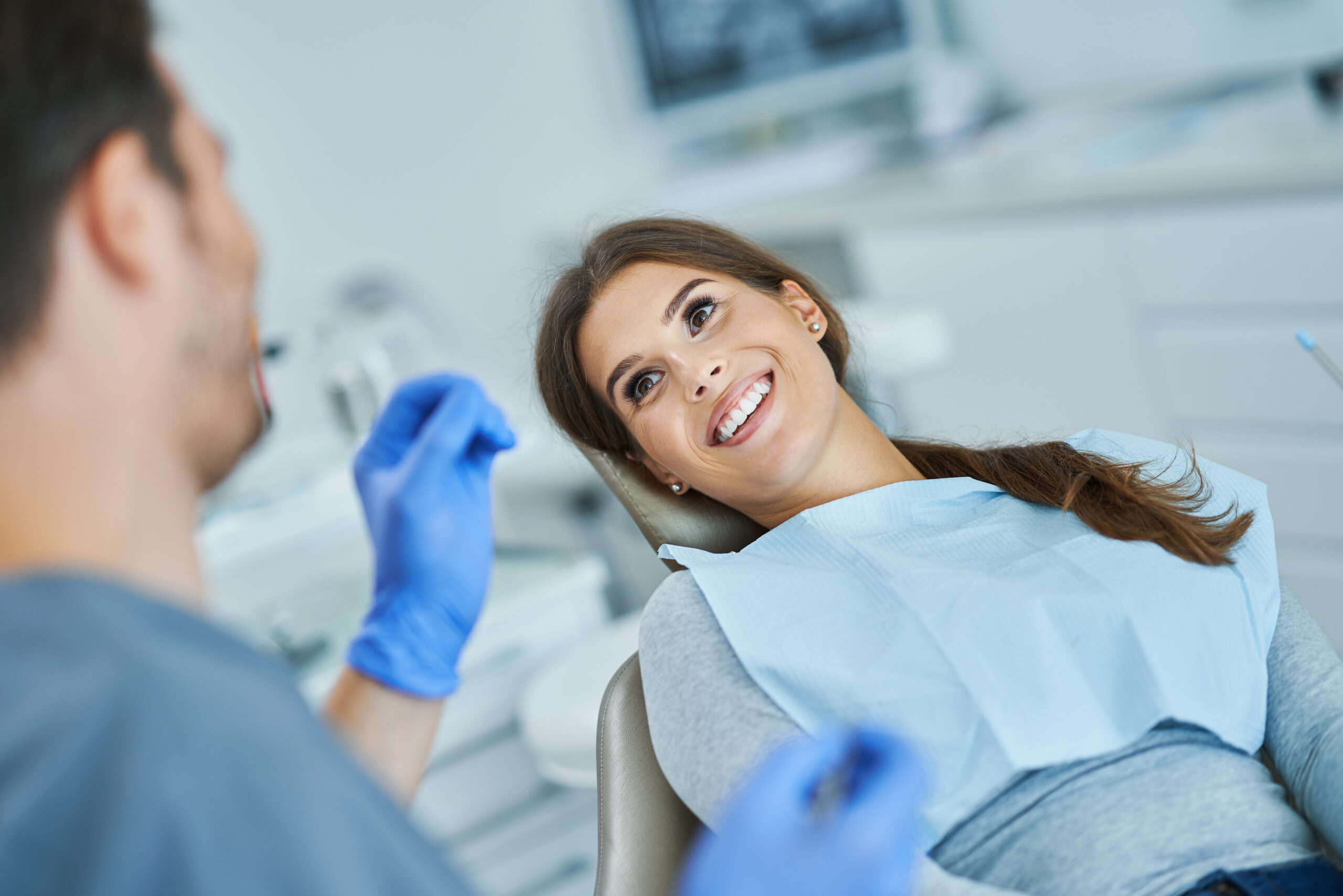Dentist consulting with a patient about a smile makeover treatment plan