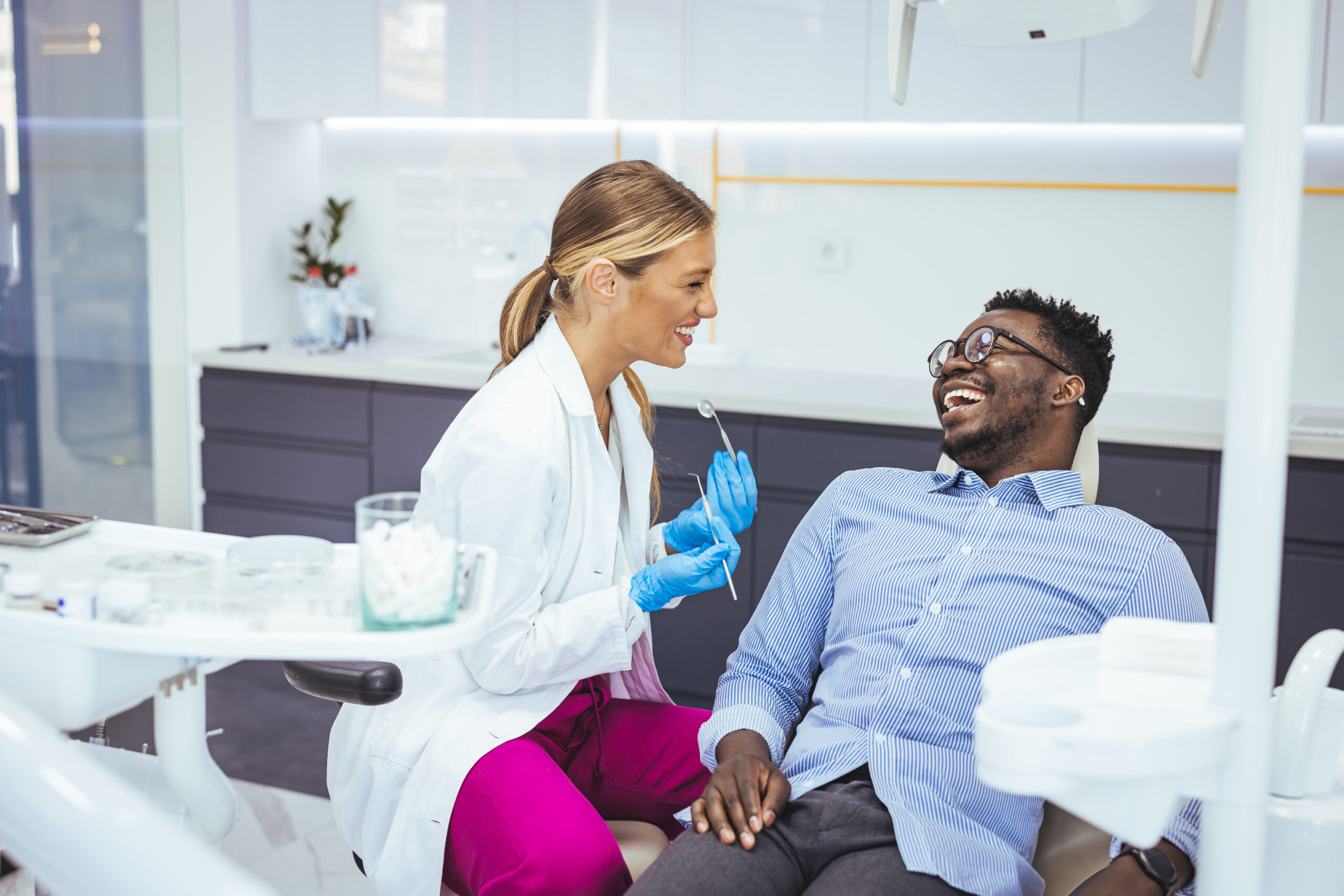 Dentist reviewing out-of-network insurance benefits with a patient